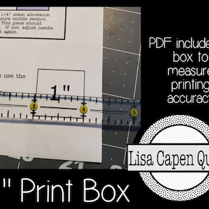 May include: A close-up of a ruler measuring a 1-inch square box printed on a white sheet of paper. The text "PDF includes 1" box to measure printing accuracy" is printed in black on a grey background. The text "Lisa Capen Quilts" is printed in black on a white circle with a black dotted border. The text "1" Print Box" is printed in black at the bottom of the image.