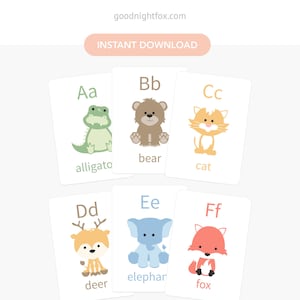 May include: A set of 9 alphabet flash cards featuring colorful illustrations of animals. Each card has a letter, the letter name, and the name of the animal. The animals include an alligator, bear, cat, deer, elephant, fox, giraffe, hippopotamus, and iguana.
