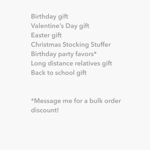 May include: A pink and white graphic with the text "Gift Ideas" in pink cursive font. The text lists different gift giving occasions, including birthdays, Valentine's Day, Easter, Christmas, birthday party favors, long distance relatives, and back to school. The text also includes a note that says "*Message me for a bulk order discount!" and the text "GOODNIGHT FOX Memory Games by goodnightfox.com".