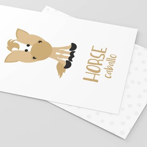 May include: A brown cartoon horse with black hooves and a white stripe on its face. The text "HORSE caballo" is written in gold below the horse.