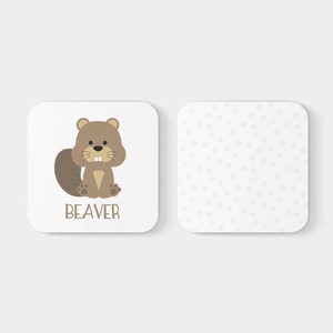 May include: A white square card with a cartoon beaver illustration and the word "BEAVER" printed below. The card is next to a white square card with a white background and a pattern of small gray dots.