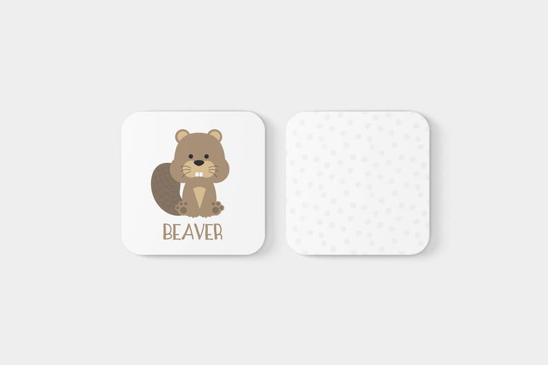 May include: A white square card with a cartoon beaver illustration and the word "BEAVER" printed below. The card is next to a white square card with a white background and a pattern of small gray dots.