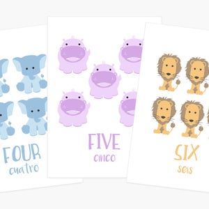 May include: Three cards with different numbers of animals. The first card has four blue elephants, the second card has five purple hippos, and the third card has six orange lions. The cards also have the numbers four, five, and six written on them in English and Spanish.