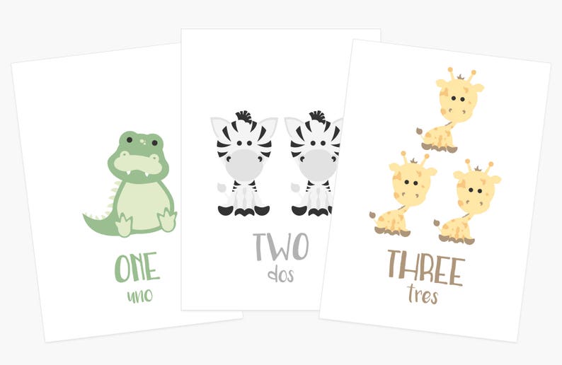 May include: Three printable cards with animal illustrations and numbers. The first card shows a green alligator with the number one and the word "uno". The second card shows two black and white zebras with the number two and the word "dos". The third card shows three yellow giraffes with the number three and the word "tres".