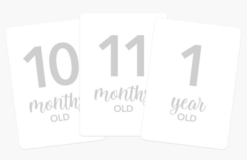 May include: Three white cards with gray numbers and text. The first card says "10 months old", the second card says "11 months old", and the third card says "1 year old".