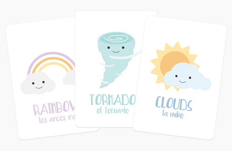 May include: Three illustrated flashcards with weather-related images and text. The first card shows a rainbow with a cloud underneath. The text reads "RAINBOW los arcos iris". The second card shows a cartoon tornado with a smiling face. The text reads "TORNADO el tornado". The third card shows a sun with a cloud underneath. The text reads "CLOUDS la nube".