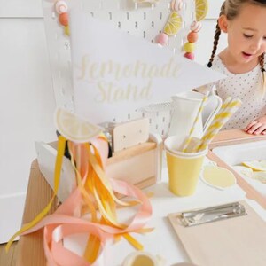 Preschool dramatic play lemonade stand printable designed to keep toddlers busy at home while building communication skills and creativity through interactive role play.