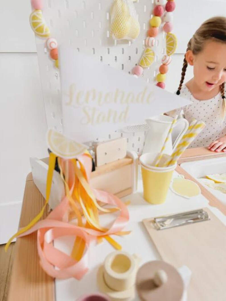 Preschool dramatic play lemonade stand printable designed to keep toddlers busy at home while building communication skills and creativity through interactive role play.