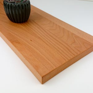 Wandregal Wandboard Bücherregal schwebend aus geölter Buche