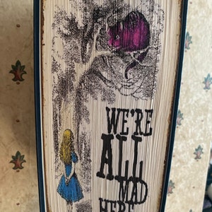 We’re All Mad Here Fore-Edge Photo Strip Book Fold