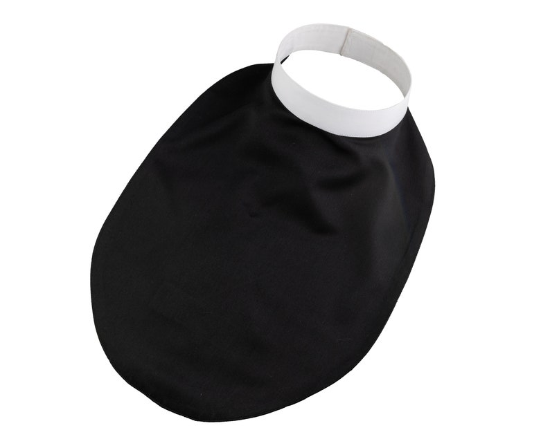 May include: A black cassock with a white collar. The cassock is a long, loose-fitting garment worn by clergy.