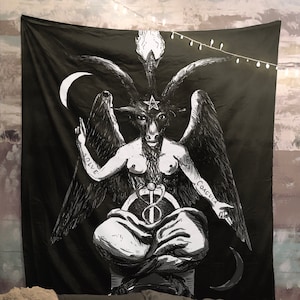 May include: Black and white tapestry featuring a detailed illustration of a goat-headed figure with wings, sitting on a throne. The figure has a pentagram on its forehead and the words "Solve" and "Coagula" written on its arms.