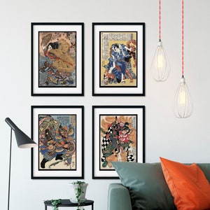 May include: Four framed Japanese woodblock prints depicting scenes of samurai warriors and mythical creatures. The prints are displayed on a white wall above a green sofa with an orange pillow.