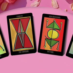 May include: Four tarot cards with black borders are displayed against a pink background. The cards feature colorful abstract illustrations and titles such as "Stability" and "New Beginnings." The card titled "The Emperor" has a red and yellow geometric design.
