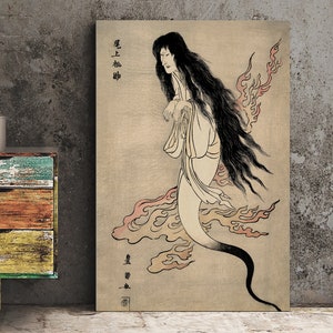 May include: A vintage-style print of a Japanese Yokai, a supernatural being. The artwork depicts a long-haired figure in flowing robes, with flames and text in Japanese. The color palette includes beige, black, and red.