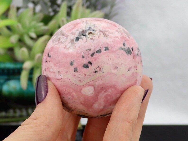 May include: A rustic wooden sign with the text "Welcome to our home" in white lettering. The sign features a distressed finish and a simple, inviting design, perfect for entryway decor.