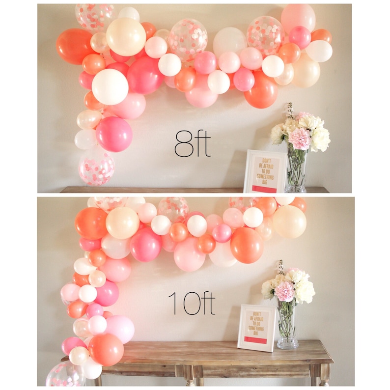 A size example shows a 8 foot and 10 foot balloon garland made up of coral, pearl peach, rose, white, and matching confetti filled balloons sitting above a 6 foot table for comparison.