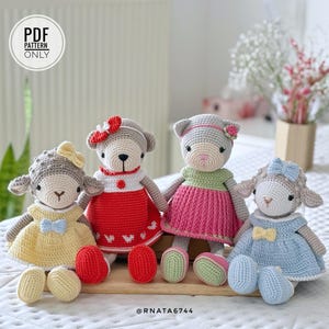 May include: A set of three ceramic mugs with a speckled, matte finish. Each mug features a different color: light blue, cream, and gray. The mugs have a simple, modern design with a rounded shape and a handle.