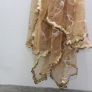 Peach net dupatta with rose gold border main image 0