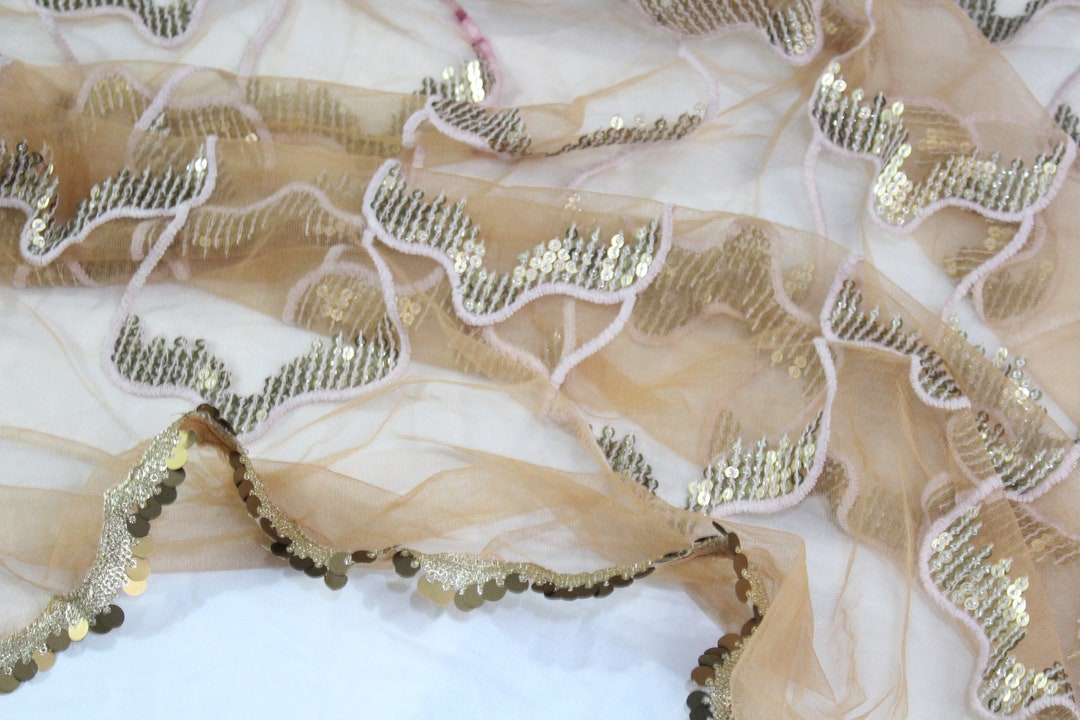 Peach net dupatta with rose gold border