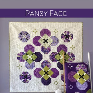 May include: A quilt pattern called "Pansy Face" featuring a purple and green floral design. The pattern is available in two sizes: 66 1/2 inches by 66 1/2 inches for a lap quilt and 97 inches by 97 inches for a queen quilt.