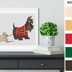 May include: Cross-stitch pattern featuring two dogs, one wearing a red and green plaid sweater. The larger dog is a black Scottish Terrier and the smaller dog is a white terrier. The smaller dog is pulling a red string attached to the larger dog's collar.