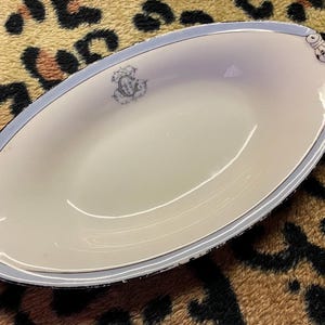 Old porcelain dish from the large central depot rue Bonaparte paris Emile Galée