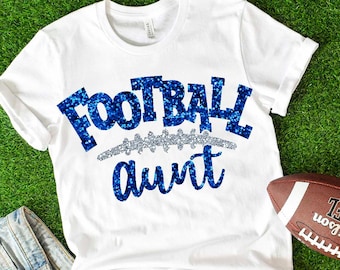 May include: White t-shirt with blue glitter text that says "Football aunt".