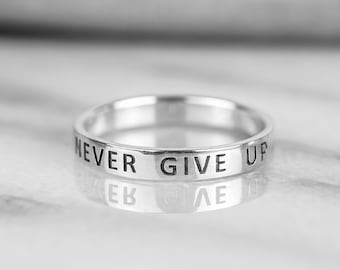 Anillo de plata de ley 925 con inscripción motivacional: Nunca te rindas.