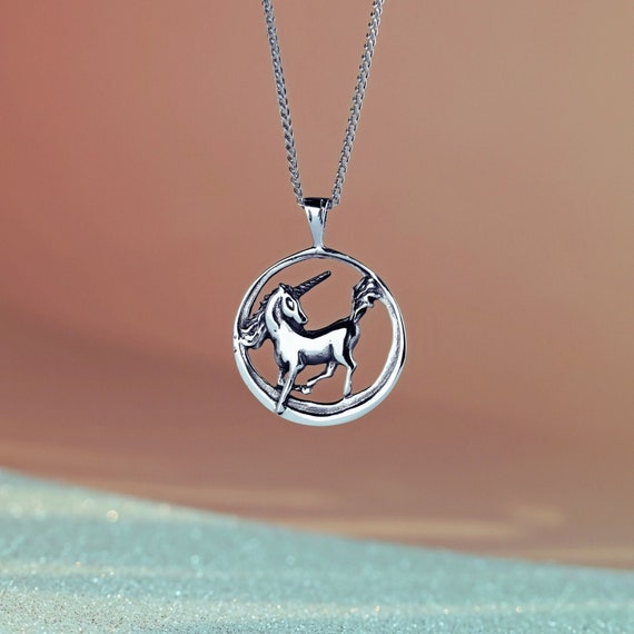 Collana con pendente a forma di unicorno in cristallo bicolore in argento sterling