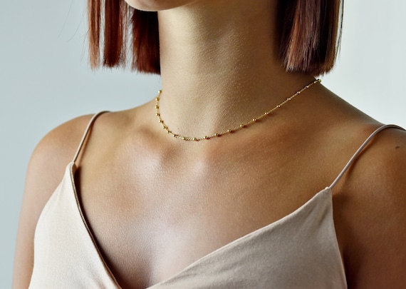 Satellite choker necklace gold deals
