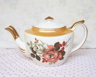 Tetera Gibsons Staffordshire Floral de los años 50 con estampado de rosas blancas y rosas. Gibsons Sons, Inglaterra.