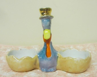 Salero y pimentero japonés Lusterware con figura de ganso de los años 60.