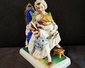 Old Paris Porcelain Figural Inkwell Mother Reading to Child with Pounce Pot mid 19th century