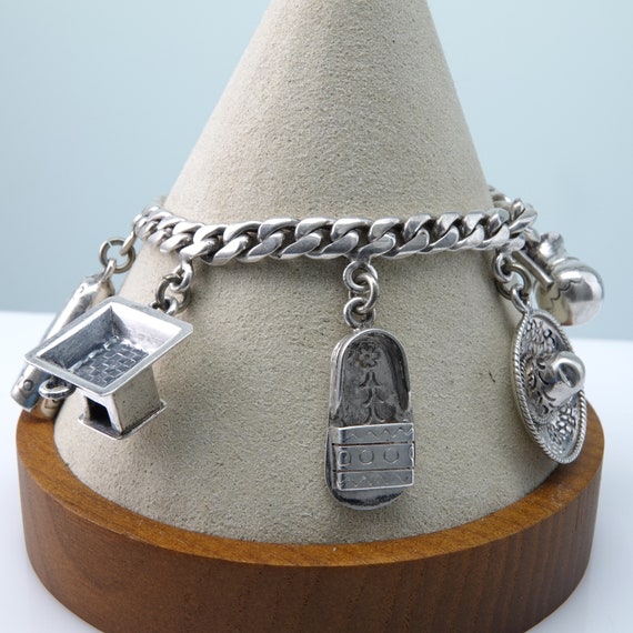 7" 1950's Rosi Mexican Silver Charm Bracelet.