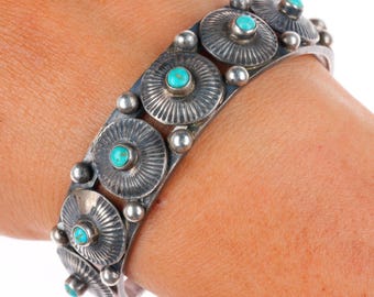 Pulsera tipo brazalete Navajo de plata esterlina con turquesa ojo de serpiente de 6,25 pulgadas, circa 1930.