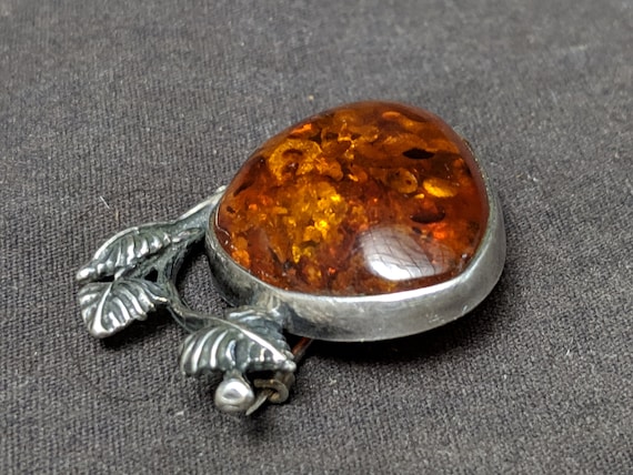 Antique amber best sale brooch