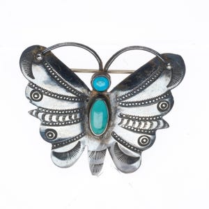 Spilla/spilla a forma di farfalla Navajo in argento sterling con stampa a mano e turchese, degli anni &#39;40 circa