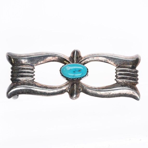 Vintage Navajo cast sterling silver belt buckle with turquoise Ketoh design
