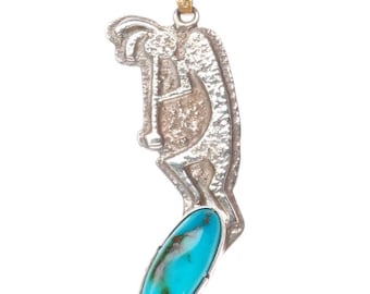 Colgante Kokopelli de Morton Navajo Tufa Cast Whirling Wind Ray con una hermosa turquesa.