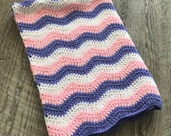 Pink, purple & white crocheted baby blanket