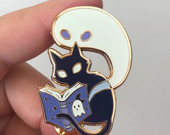 Ghost Stories - Glow in the Dark - Spooky Cat and Ghost Reading a Book - Hard Enamel Pin