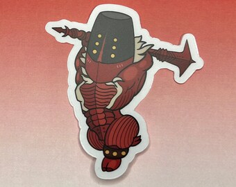 May include: A red and black cartoon character wearing a helmet with gold accents and holding a spear. The character is standing on one leg and has a large, round body.