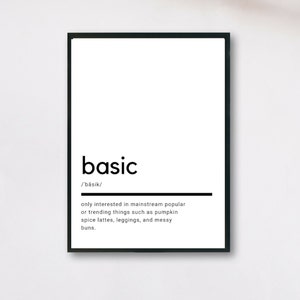 May include: Black and white printable wall art with the definition of the word "basic". The definition reads: "only interested in mainstream popular or trending things such as pumpkin spice lattes, leggings, and messy buns."