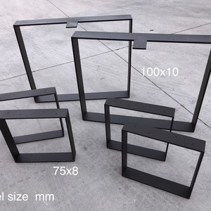 May include: Five black metal table legs of different sizes. The largest leg measures 100x10 mm, and the smallest leg measures 75x8 mm. Steel size mm.