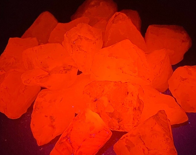 Featured listing image: One Medium FLUORESCENT MANGANO CALCITE crystal from Peru. Manganese-bearing pink calcite.