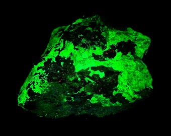 Fluorescent Willemite, Calcite, Garnet, and Franklinite specimen. Fluorescent UV shortwave longwave midwave. Franklin Mine, Nj.