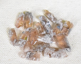 ONE Imperial Topaz, Bixbyite, and Rhyolite crystal point from Utah.
