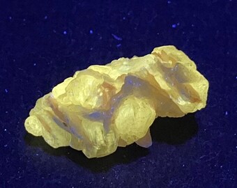 FLUORESCENT CERUSSITE and Barite crystal from Touissit, Touissit-Bou Beker mining district, Morocco. Longwave LW (365nm) Uv Fluorescence
