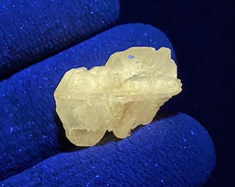 FLUORESCENT CERUSSITE crystal from Touissit, Touissit-Bou Beker mining district, Morocco. Longwave LW (365nm) Uv Fluorescence
